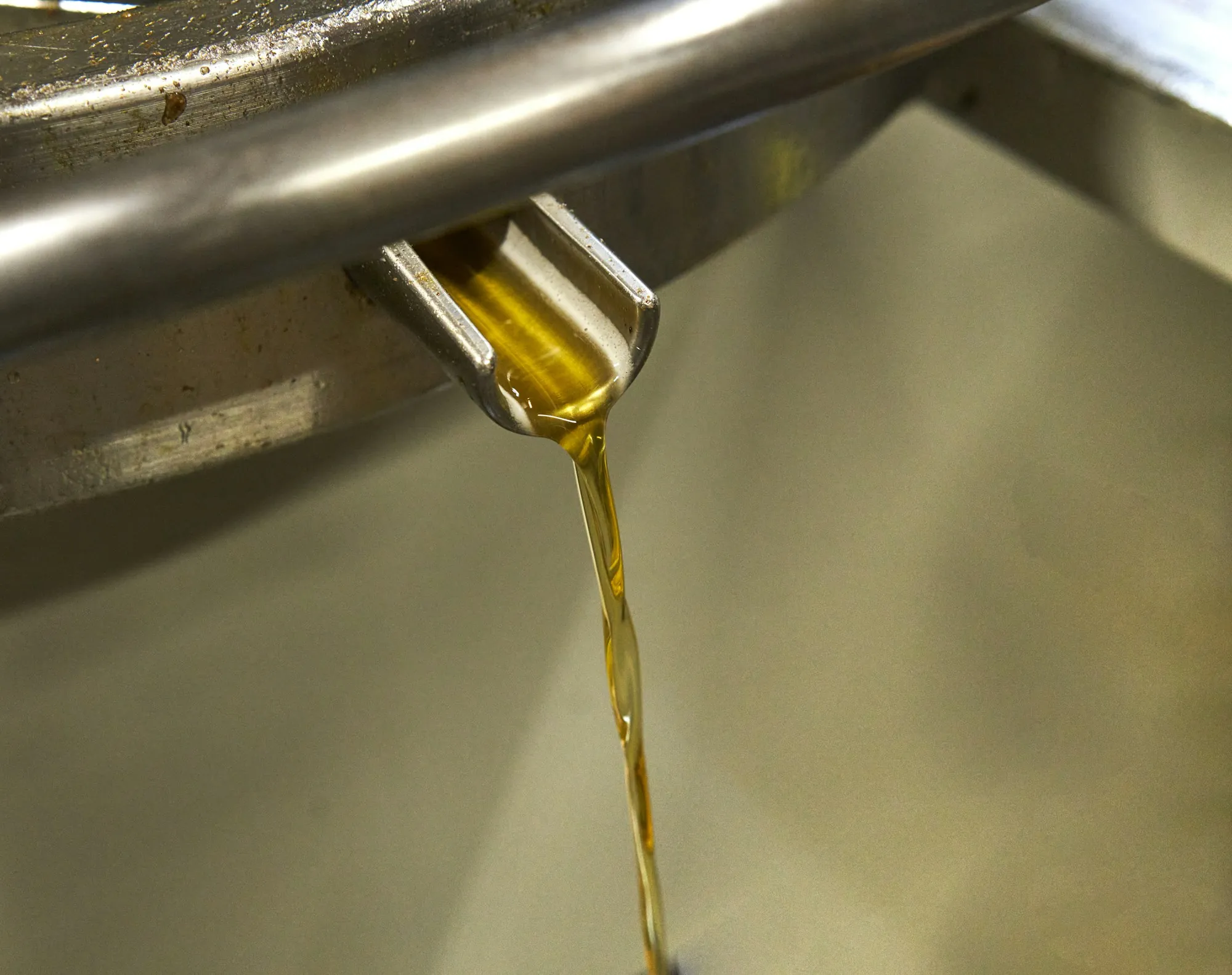 Fresh motor oil pouring in a steady stream